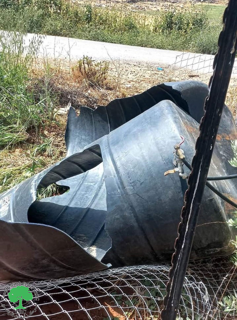 Settlers made holes in two water tanks in the village of Al-Mughayer, Ramallah and Al Bira Governorate