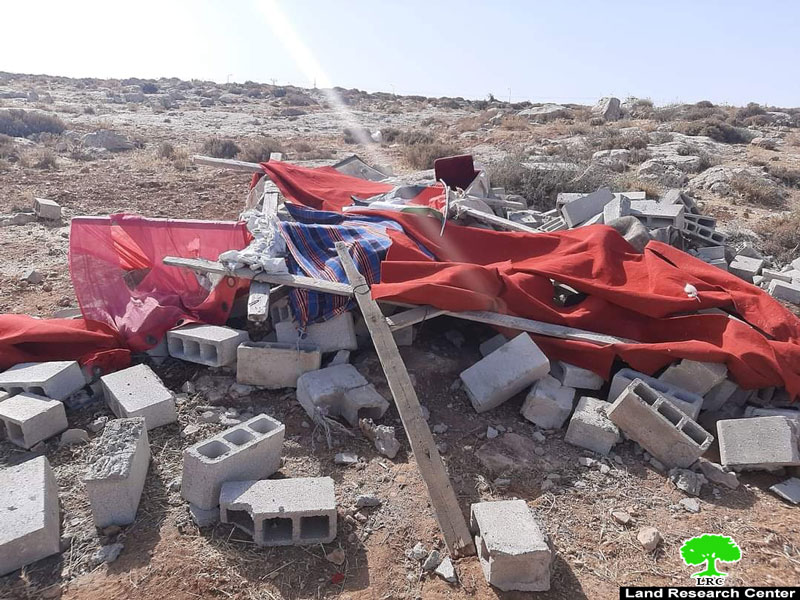 Settlers demolish an agricultural service room and three tents in “Khallet Al-Adra”, east of Yatta, Hebron Governorate