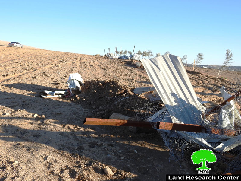 The Israeli occupation demolishes an agricultural service room and bulldozes a metal fence in the village of Al-Fraijat, south of Al-Ramadin, in Hebron Governorate